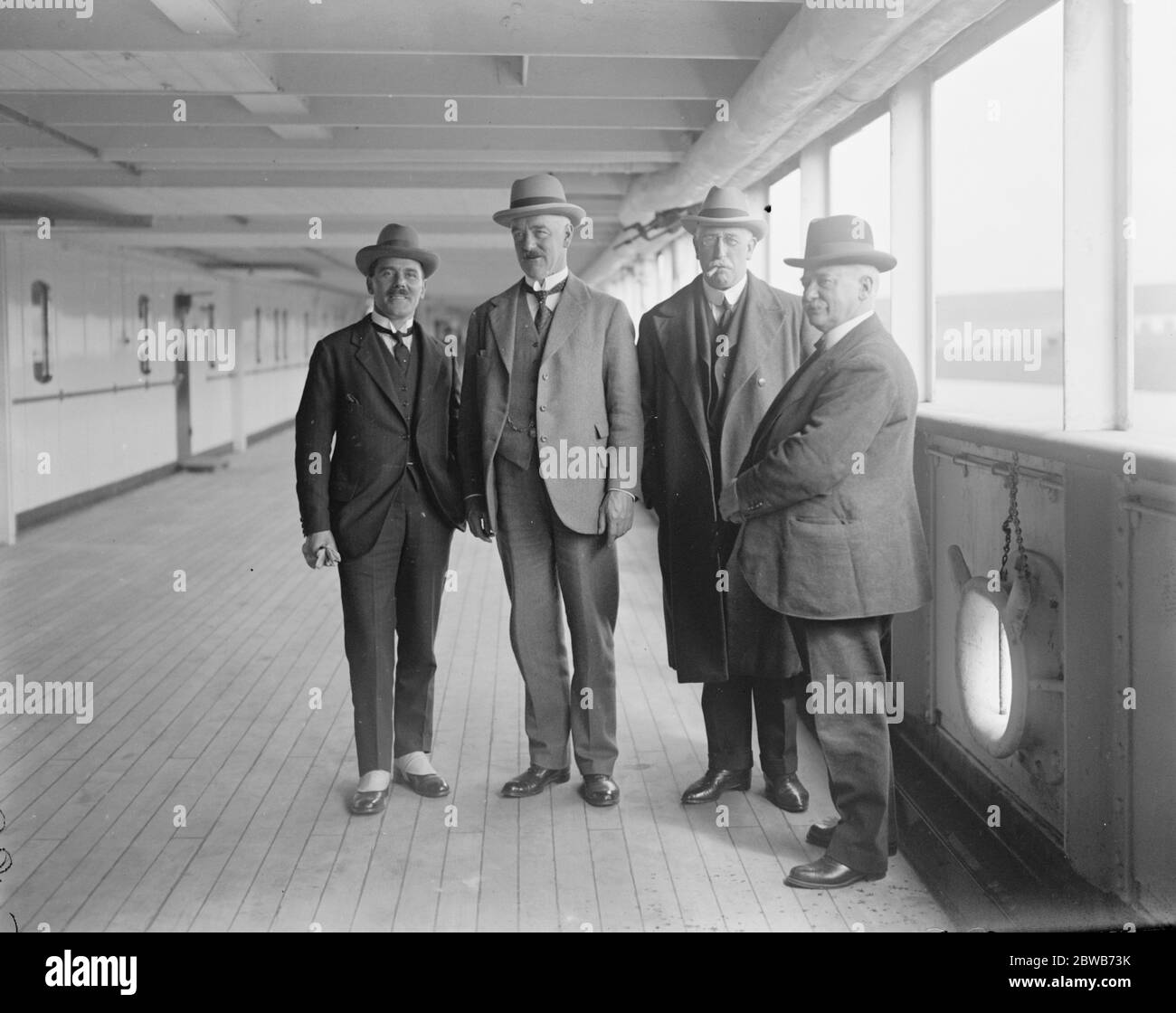 The latest oil burning liner . The White Star liner , SS Homeric  was inspected at Southampton Docks after her conversion into an oil burning liner . Left to right : Colonel H Concannon , OBE , Sir Herbert A Walker , Mr P E Curry , Major Gilbert S Szlumper . 24 April 1924 Stock Photo