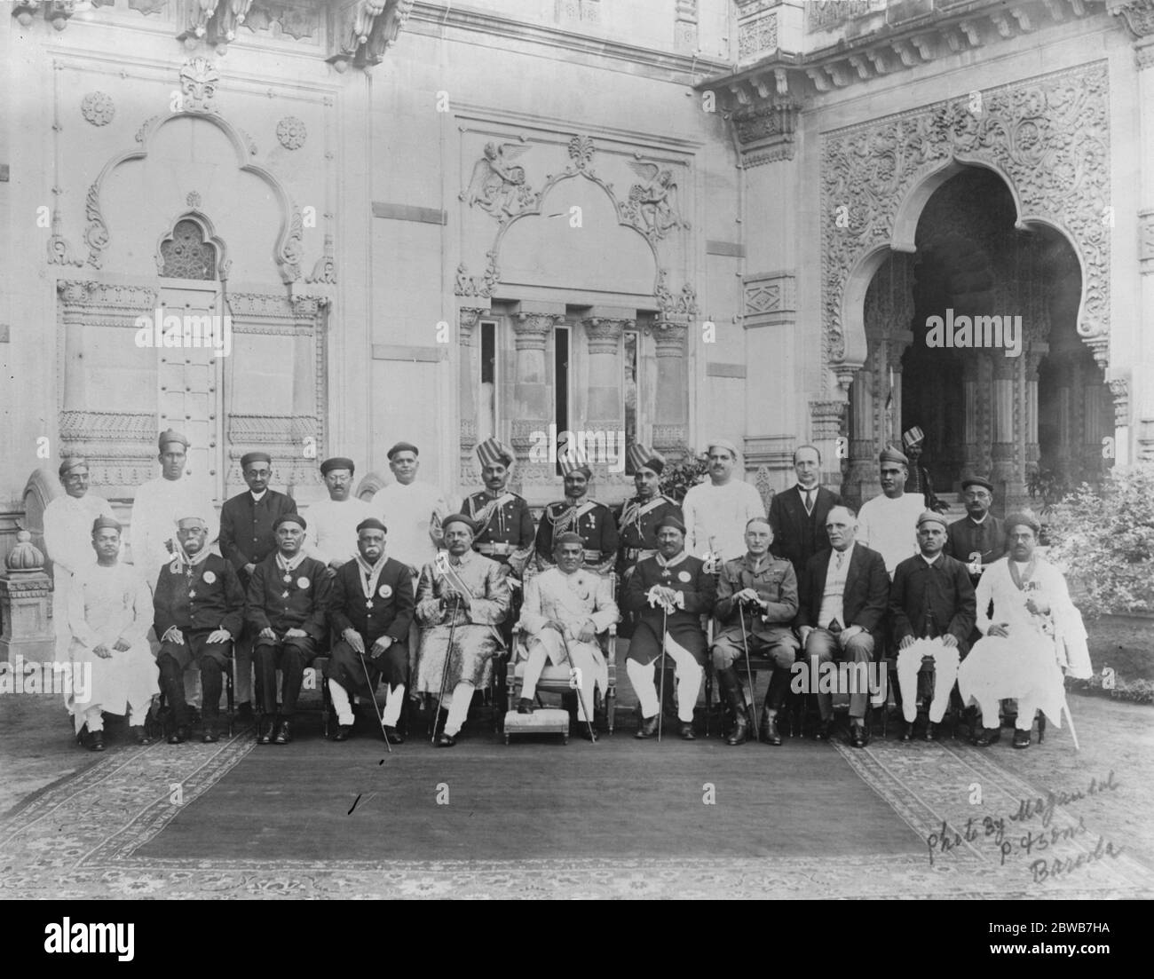 Jubilee celebrations in Baroda State , India State civil officials and personal staff of his highness the Maharajah of Baroda , who is seated in the middle . 3 December 1926 Stock Photo