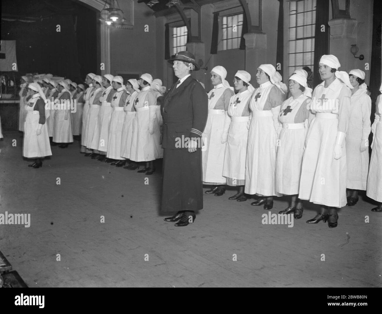 A well known actress as Red Cross section leader . At an official inspection of the West Hampstead Division of the British Red Cross Society , Miss Helen Ferrers , the well known actress , took part in a practical demonstration which formed a striking feature of the occasion . 15 April 1924 Stock Photo