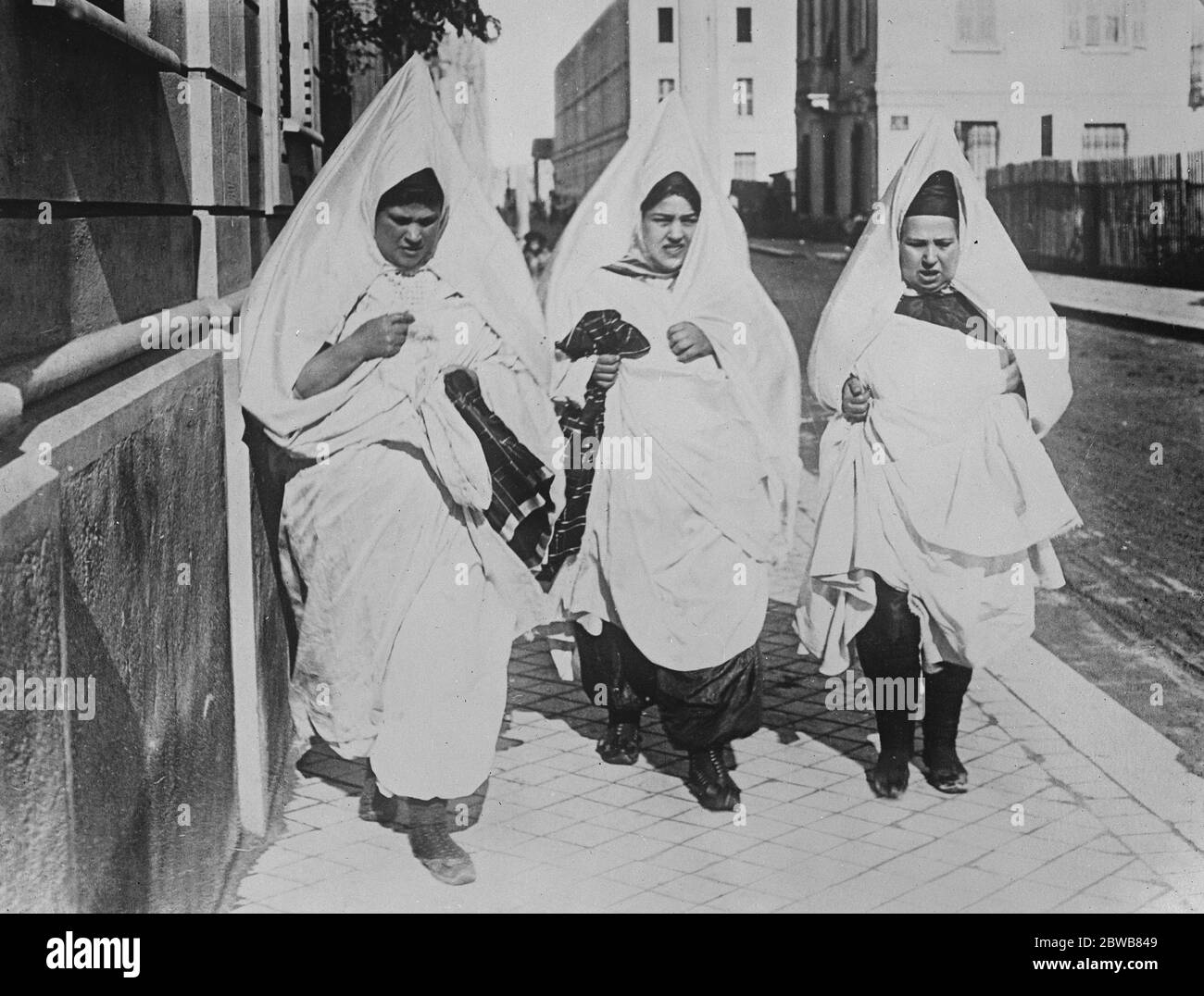 Curious to us , but an everyday sight in North Africa An interesting picture from the City of Tunis , showing three Jewish women in characteristic costume taking their constitutional 16 January 1926 Stock Photo