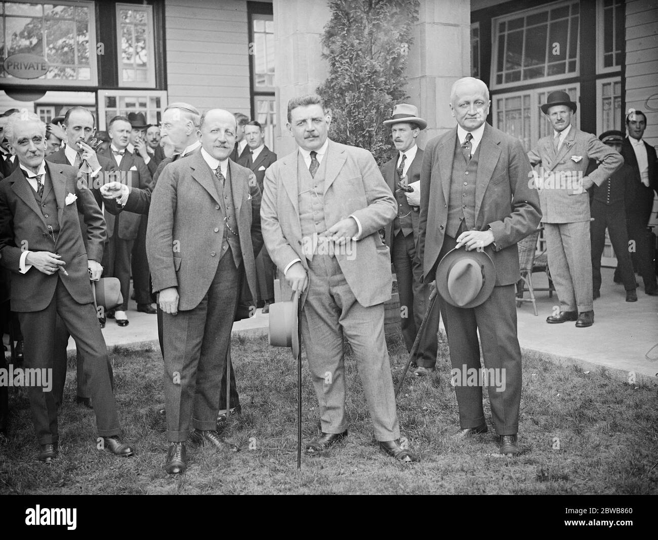 French and Belgian Premiers at Wembley . M Herriot and M Theunis , the French and Belgian Premiers , with other members of the Inter Allied Conference , visiting the Empire exhibition . 19 July 1924 Stock Photo