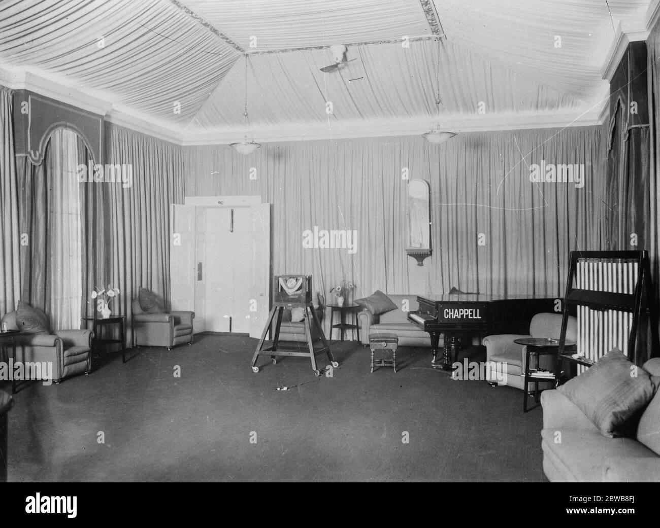 The London studio of the British Broadcasting Co . The Marconi microphone will be readily recognised on its stand in the centre . Marconi 's Wireless Telegraph Co Ltd . 1 January 1925 Stock Photo