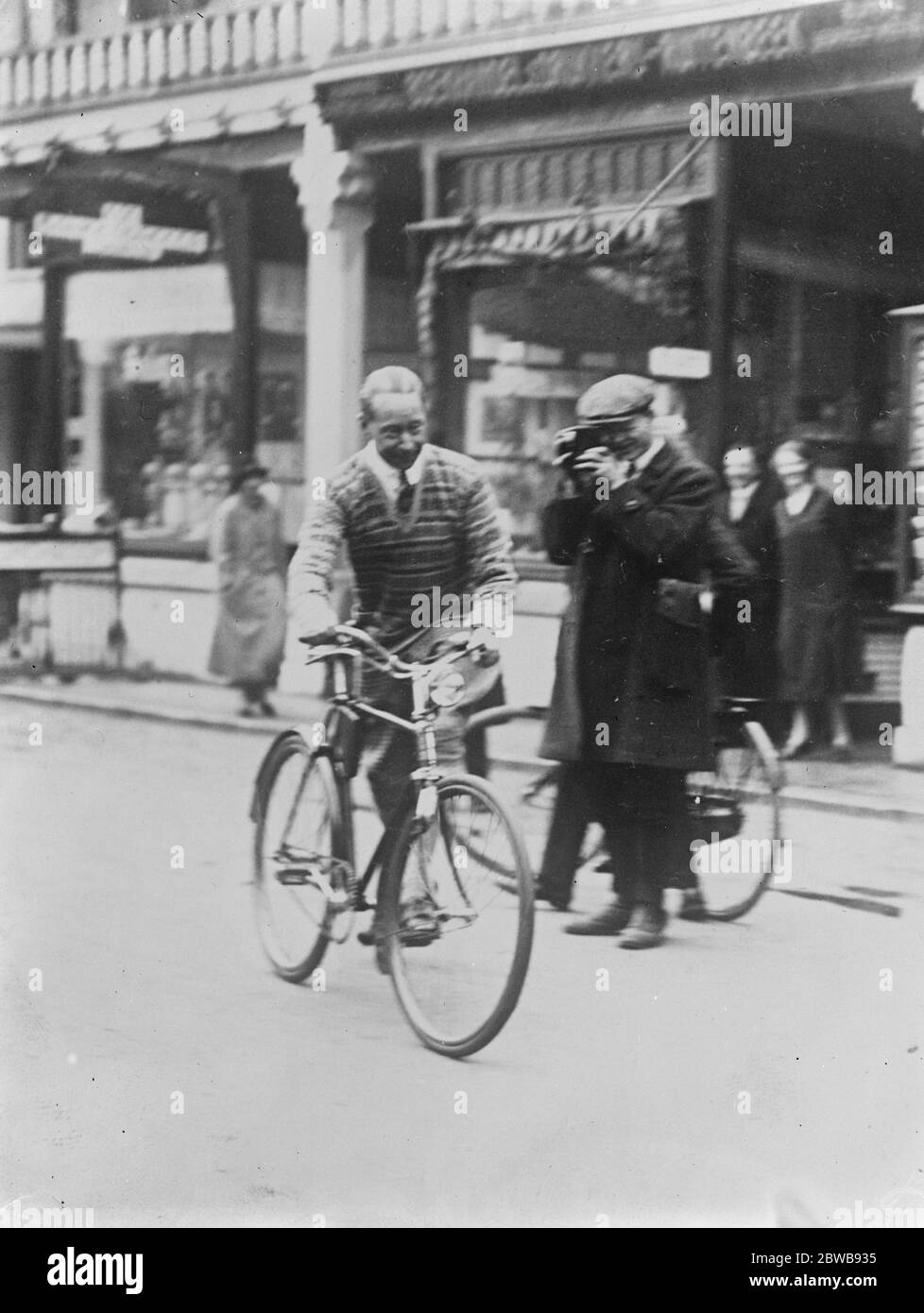 Crown Prince visits his father at Doorn , central Netherlands The ex Crown Prince Wilhelm of Germany about to mount his bicycle in one of the streets of Doorn where he is on a visit to ex Kaiser . 3 February 1926 Stock Photo