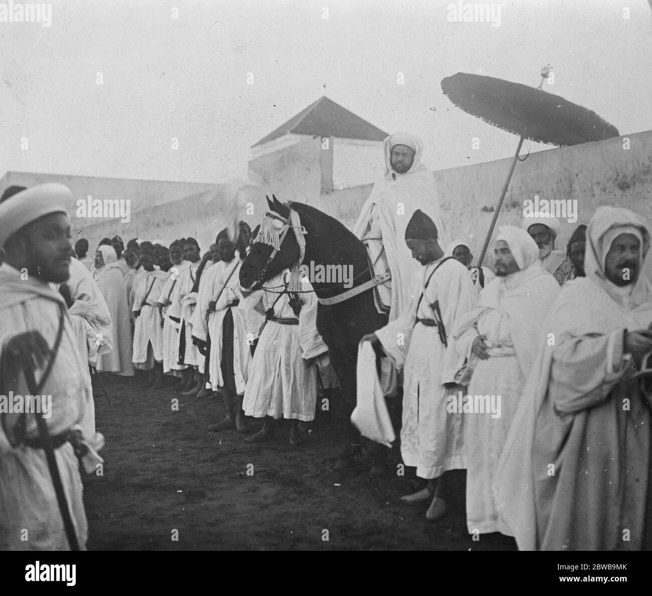 Sultan of Morocco distributes decorations . Moulay Youseph , Sultan of Morocco , photographed recently at Fez during the annual distribution of Honours and Decorations . 18 January 1924 Stock Photo