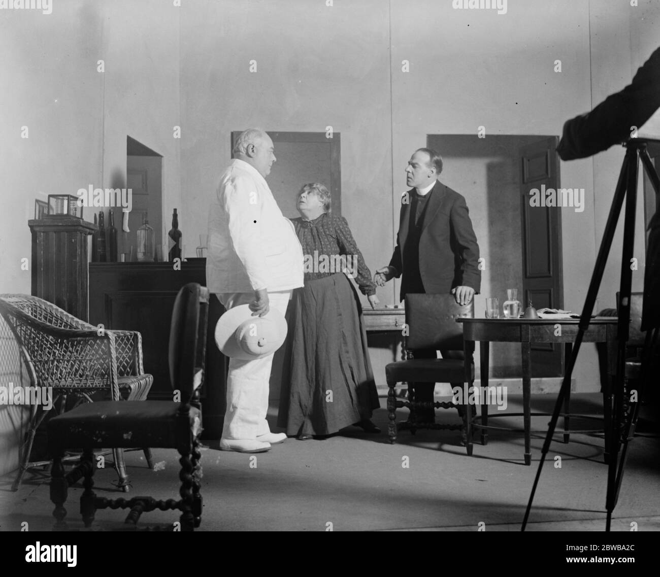 The new weird play that deals with the after life .  Outward Bound  the new Sutton Vane play to be produced at the Everyman Theatre , Hampstead , is likely to provoke much discussion . Roy Byford as the  Examiner  , Clara Greet as  Mrs Midget  and Frederick Leister as the  Reverend Duke  . 15 September 1923 Stock Photo