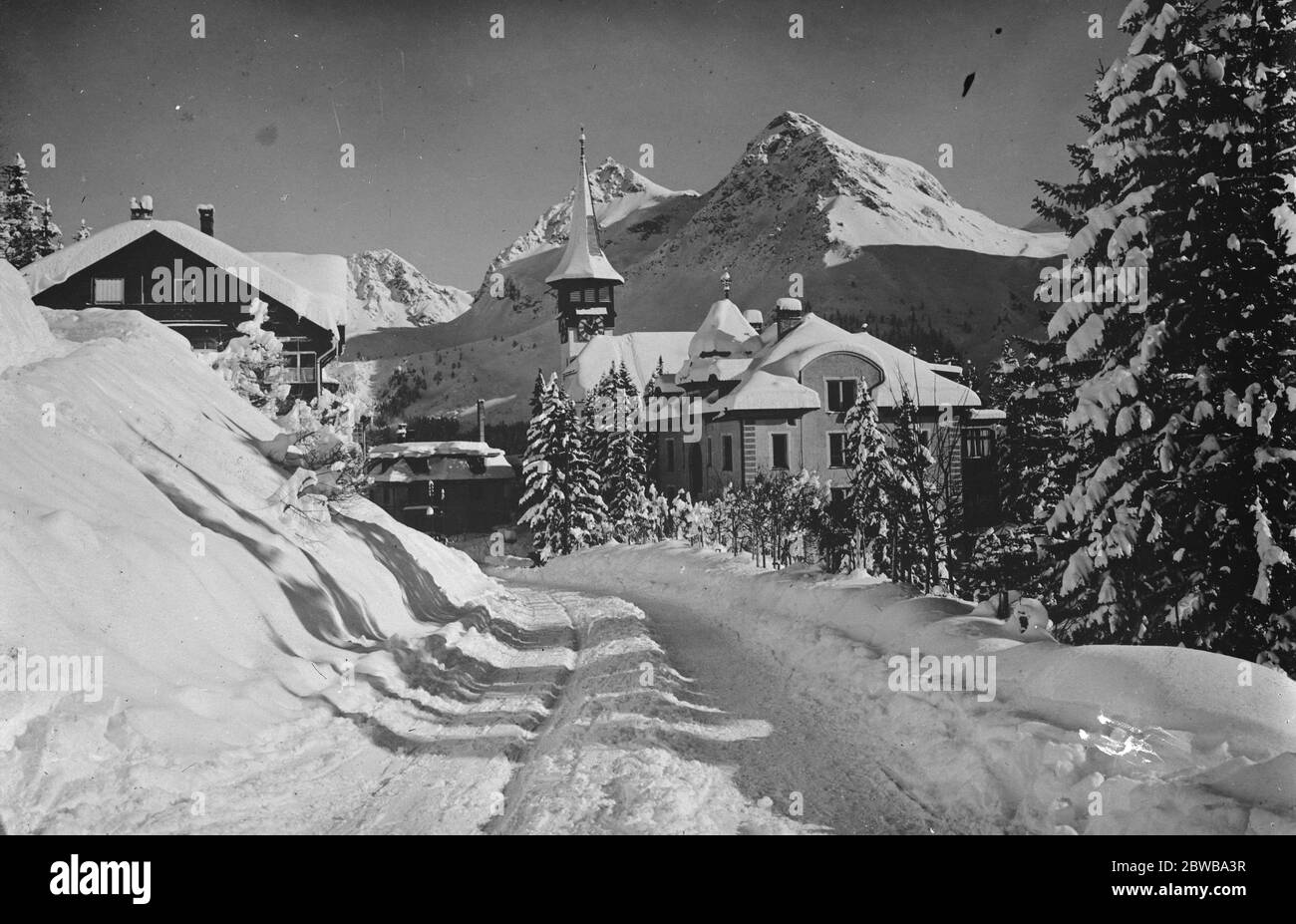 Where beauty is snow deep . This beautiful snow study is of Arosa . Switzerland. 11 December 1925 Stock Photo