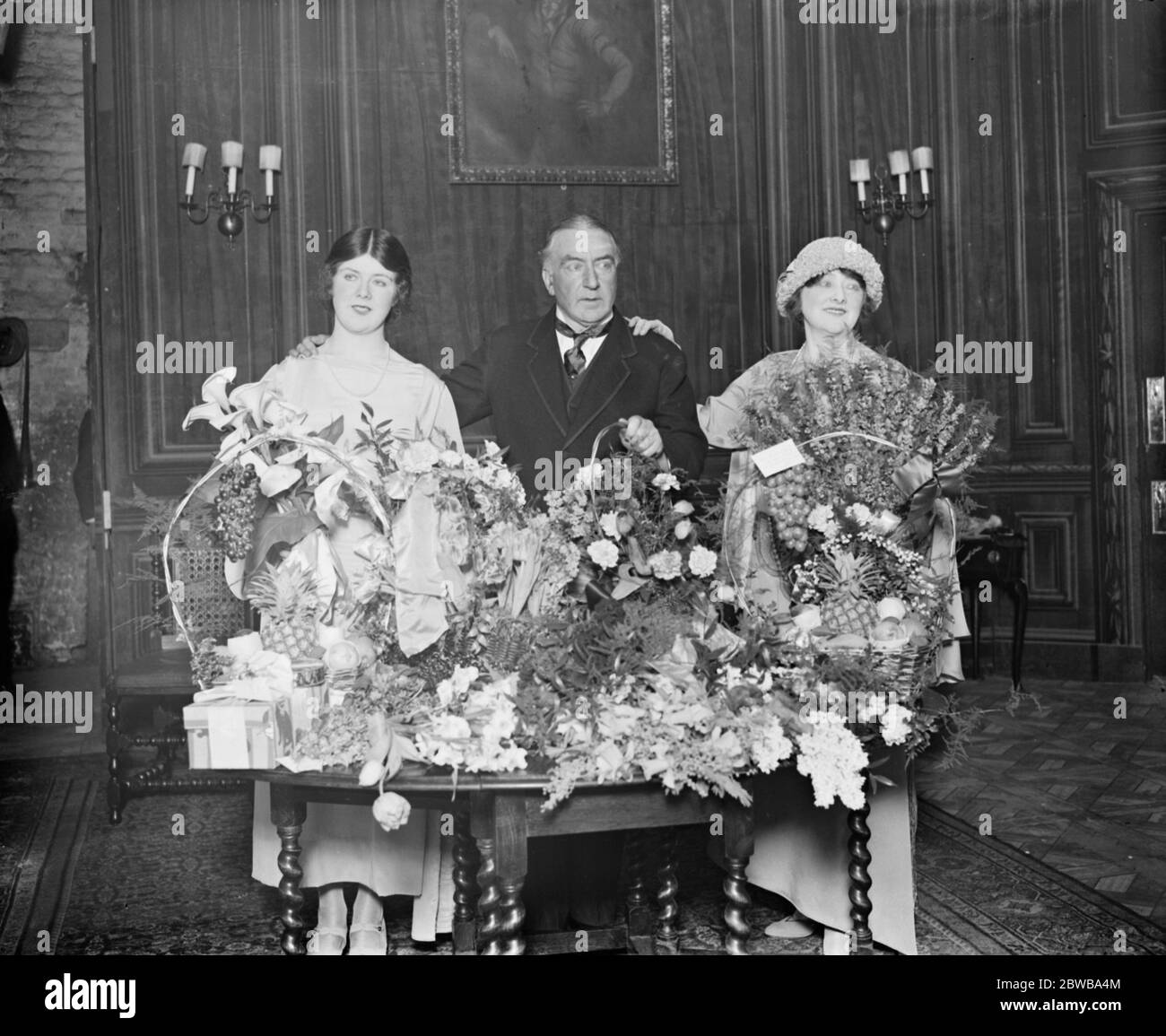 Miss Isabel Jay in play she wrote herself , joined by husband and daughter on her return to the stage . Miss Isabel Jay at the Gaiety Theatre , Hastings , in  The Inevitable  . Left to right : Miss Cecilia Cavendish , Mr Frank Curzon and Miss Isabel Jay with the numerous tributes presented to them at the close of the play . 27 February 1923 Stock Photo