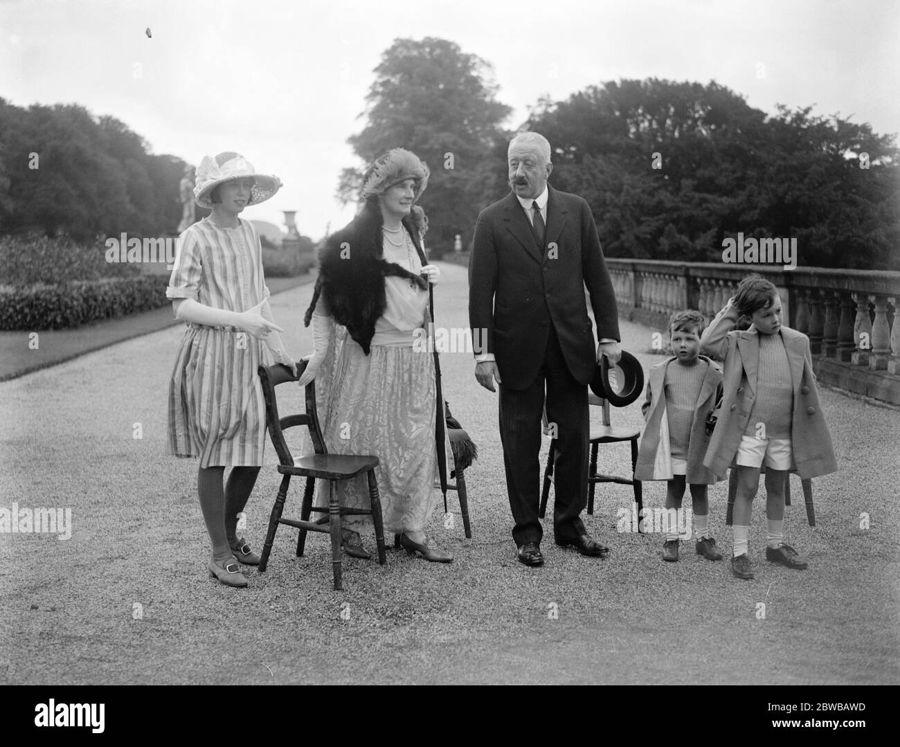 The garden party at Chatsworth House in connection with the wedding of Lady Rachel Cavendish . The Duke and Duchess of Devonshire ( the bride 's parents ) with Lady Anne Cavendish and Lord Hartington 's little sons . 3 August 1923 Stock Photo