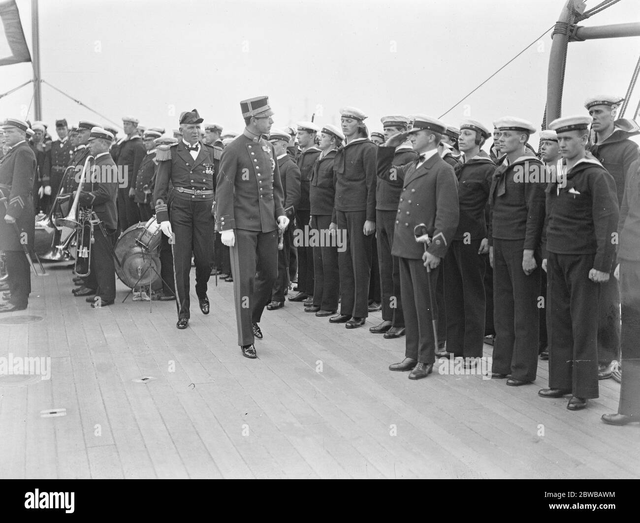 The Crown Prince of Sweden and Lady Louise Mountbatten visit the Swedish Battle Squadron at Sheerness . The Crown Prince inspecting sailors on board the flagship . 3 July 1923 Stock Photo