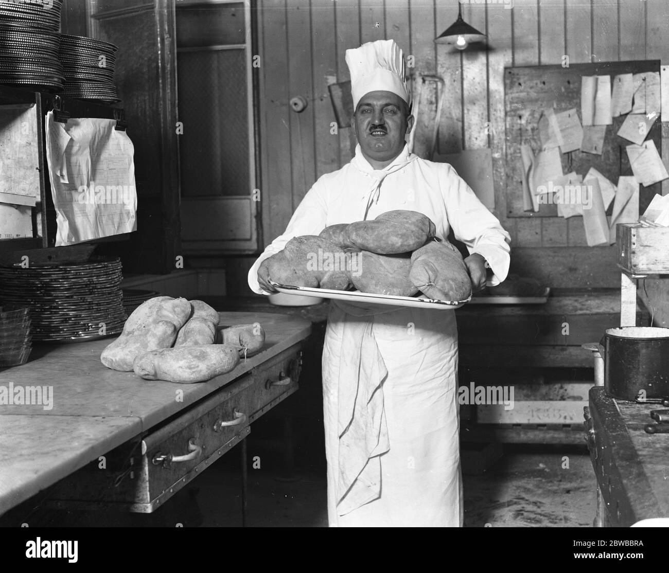 M Latry , the famous chef at the Savoy Hotel , with haggis in readiness for the St Andrews night celebrations . 29 November 1929 Stock Photo