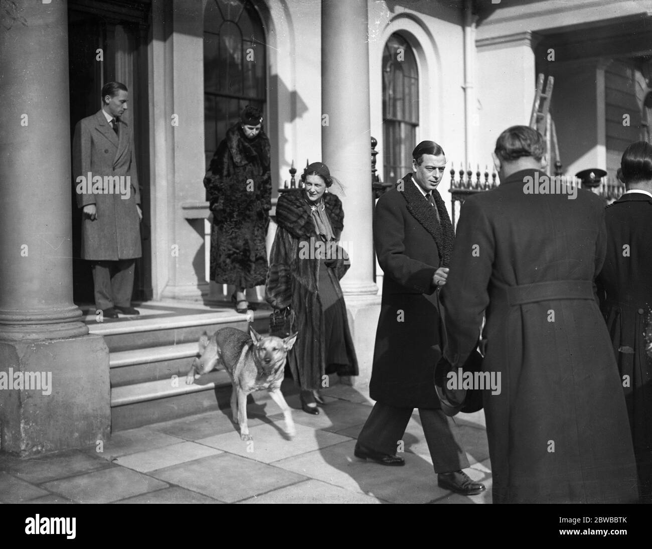 The Duke and Duchess of Kent , and their alsatian leaving home in Belgrave Square . Stock Photo