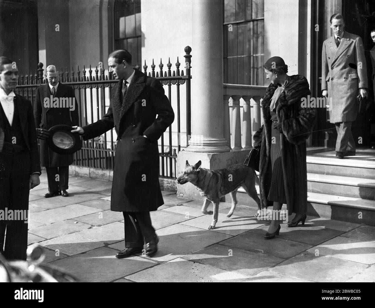 The Duke and Duchess of Kent , and their alsatian leaving home in Belgrave Square . Stock Photo