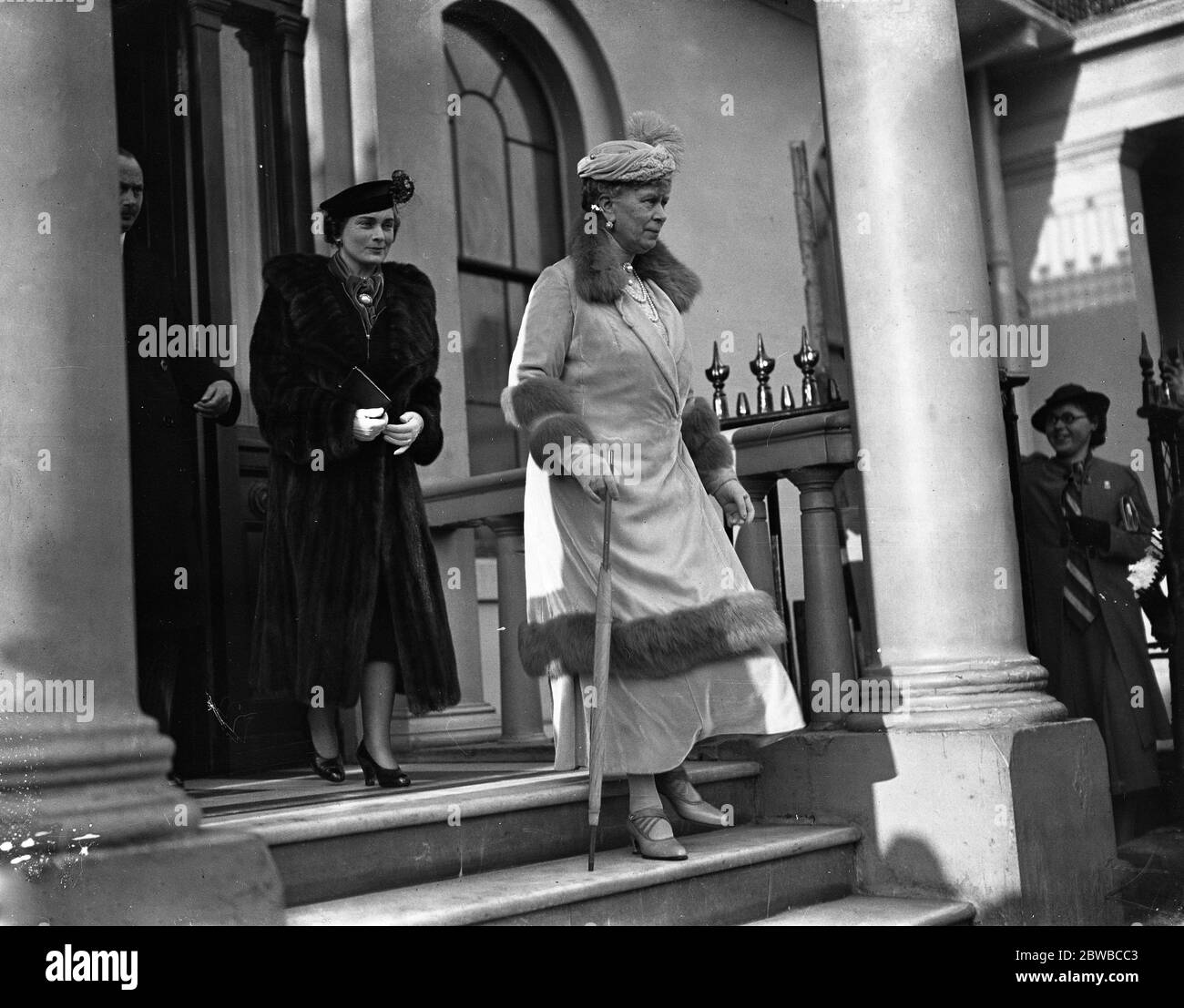 Queen Mary and the Duchess of Gloucester leaving Belgrave Square for the Christening of the infant daughter of the Duke and Duchess of Kent . Stock Photo