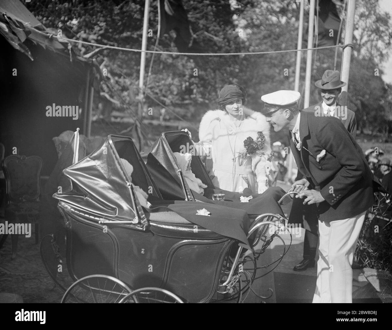 Marques of Anglesey ' s tenants and the Anglesey twins Twin son and daughter of Lord and Lady Anglesey presented with gifts at Plas Newydd of Wales 22 September 1923 Stock Photo