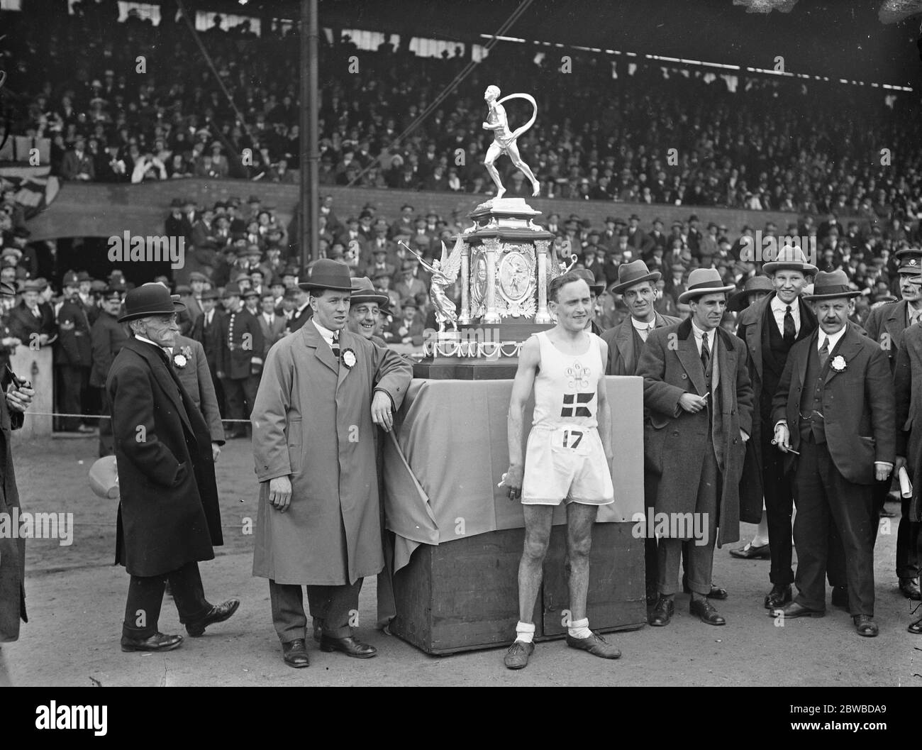 Annual marathon race from Windsor to Stamford Bridge . A G Jenson ( Denmark ) winner , with the magnificent trophy . 16 June 1923 Stock Photo