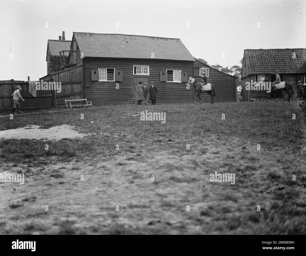 Trial gallop of ' Town Guard ' . The carefully guarded stable of ' Town Guard ' at Sherwood . Detectives are seen on guard at the door . 5 June 1923 Stock Photo