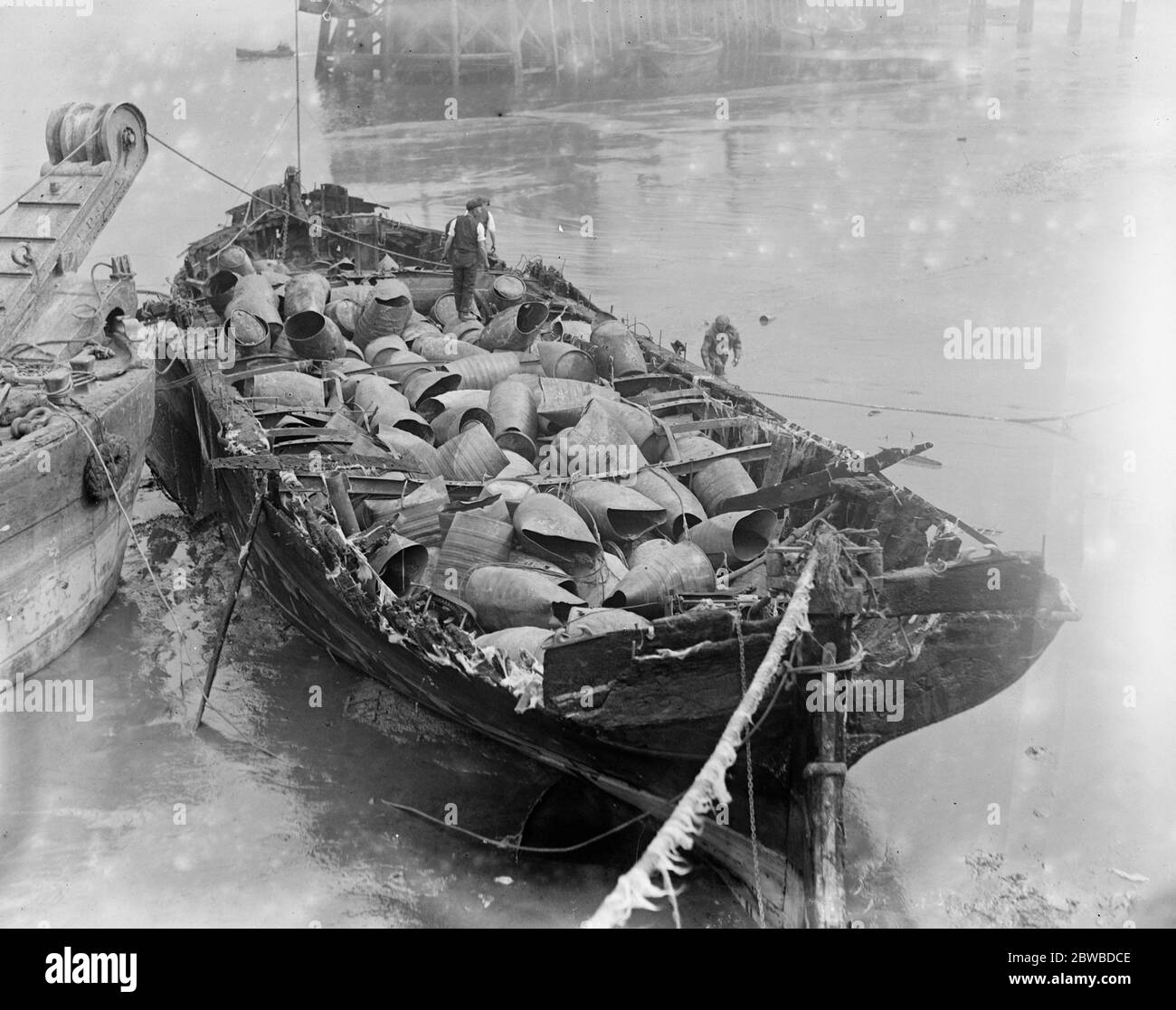 Wreck of the Dorcas. Explosion causes the loss of 450 drums of petrol. Woolwich, Greater London Stock Photo