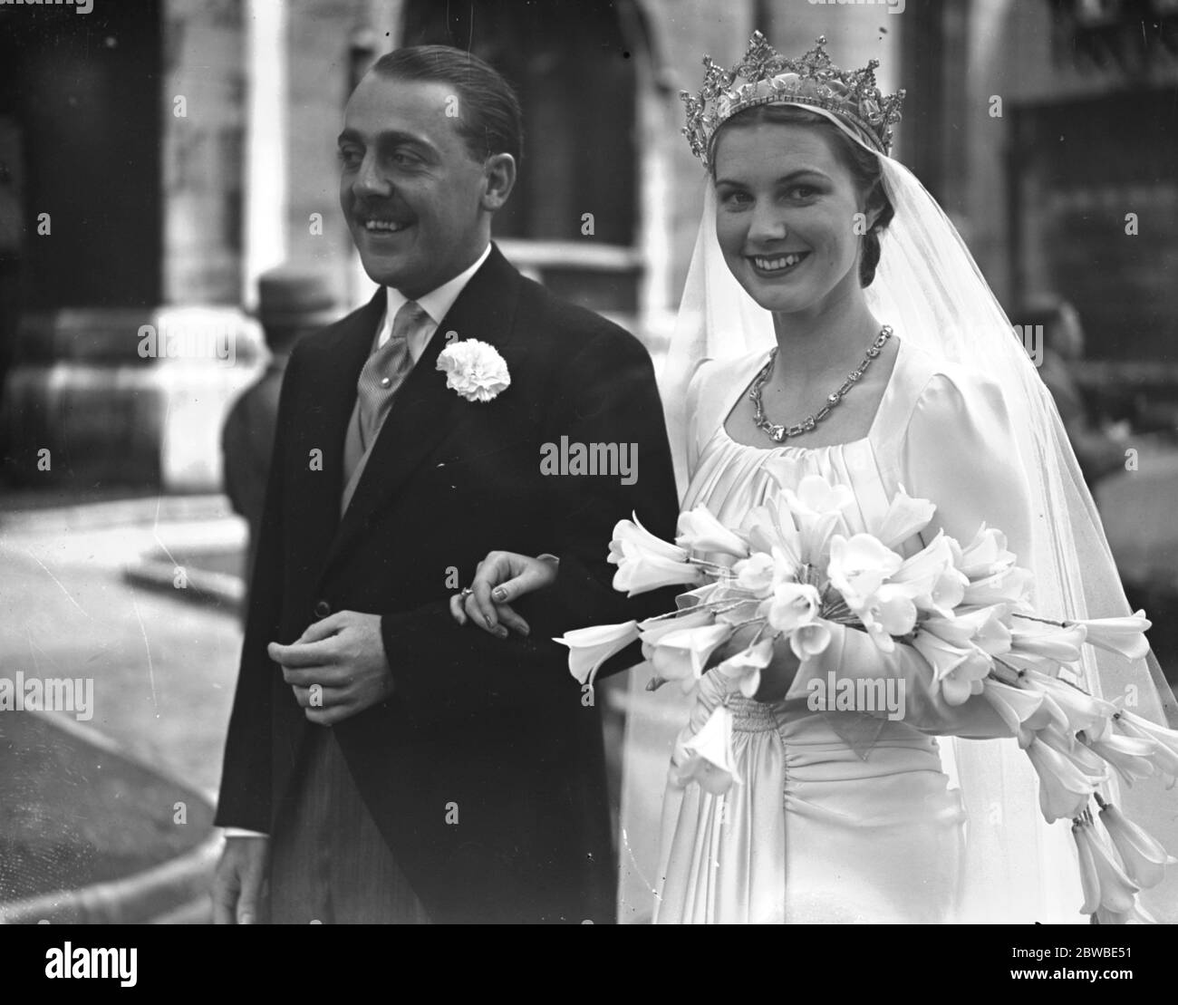 The wedding of Viscount Cowdray to the Earl of Bradford ' s daughter , Lady Anne Bridgeman , which took place today at St Margaret ' s Church , Westminster , London . Here the bride and groom leave the church . 19 July 1939 Stock Photo