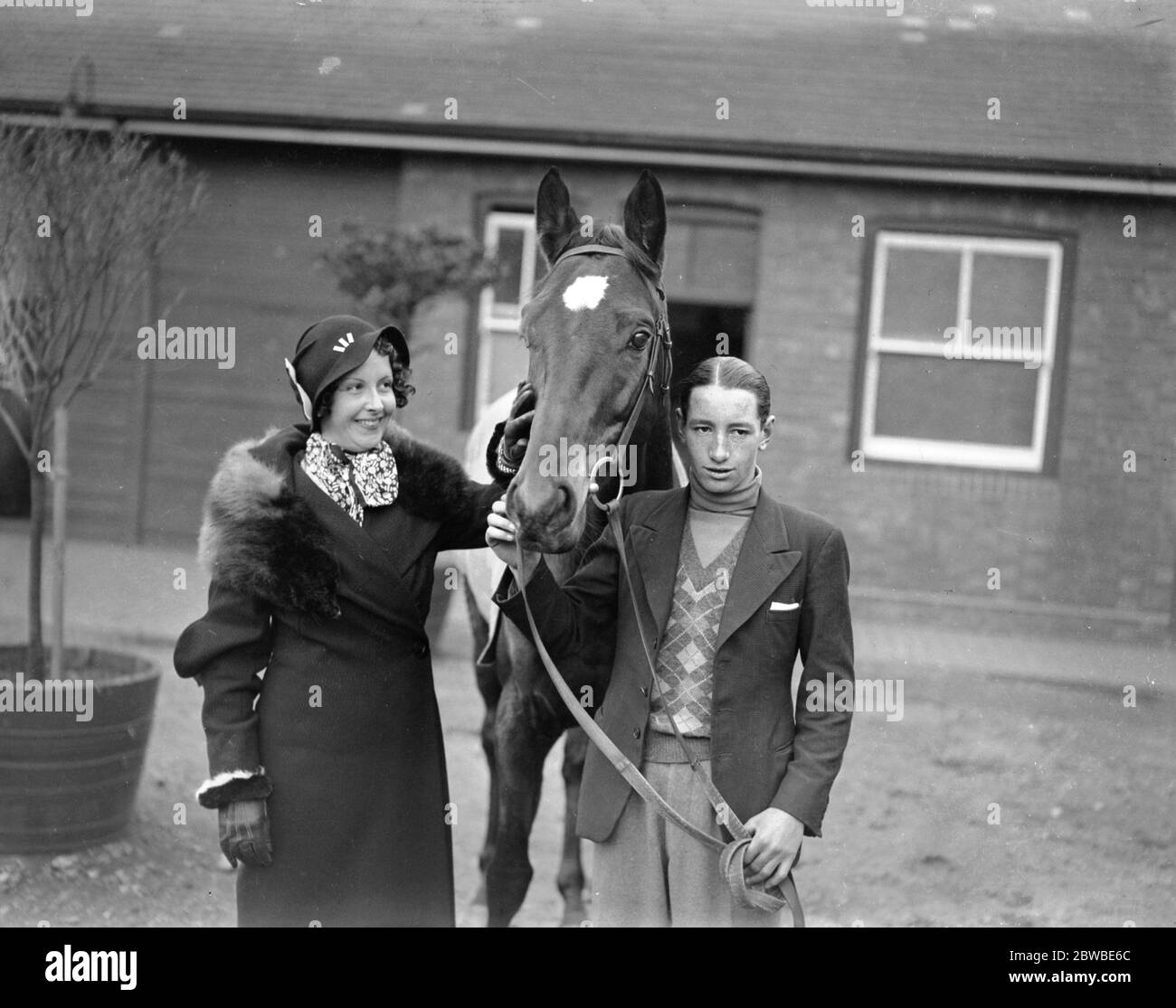 Alfred Smirke , the jockey , and his Fiancee , Miss Margery Friday ( Married 27 January 1934 ) 16 January 1934 Stock Photo