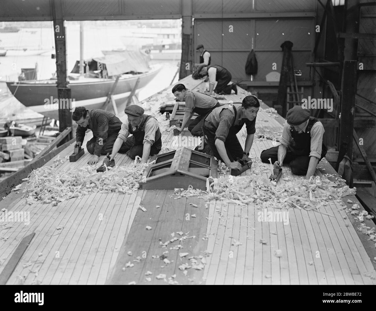 In a Yacht building yard Work at Camper and Nicholson ' s yard , Gosport on Mr T O Sopwith ' s new yacht ' Tomahawk ' 23 May 1939 Stock Photo