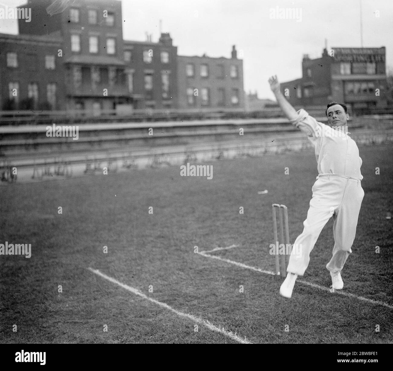 South African cricketers practice at the Kennington Oval , London Claude Carter ( Natal ) , the bowler in action 26 April 1924 Stock Photo