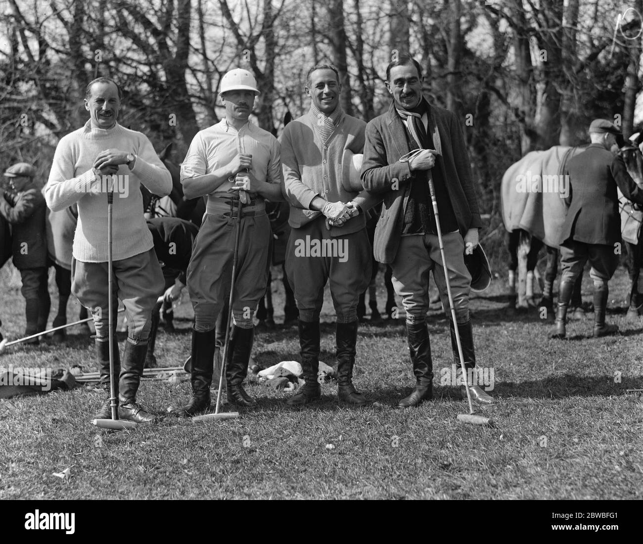 Polo at Tidworth . The English team practising for their upcoming matches at the Hurlingham Club . From left to right ; Colonel Tomkinson , Lord Dalmeny , Lord Wodehouse and Major Lockett . 1921 Stock Photo