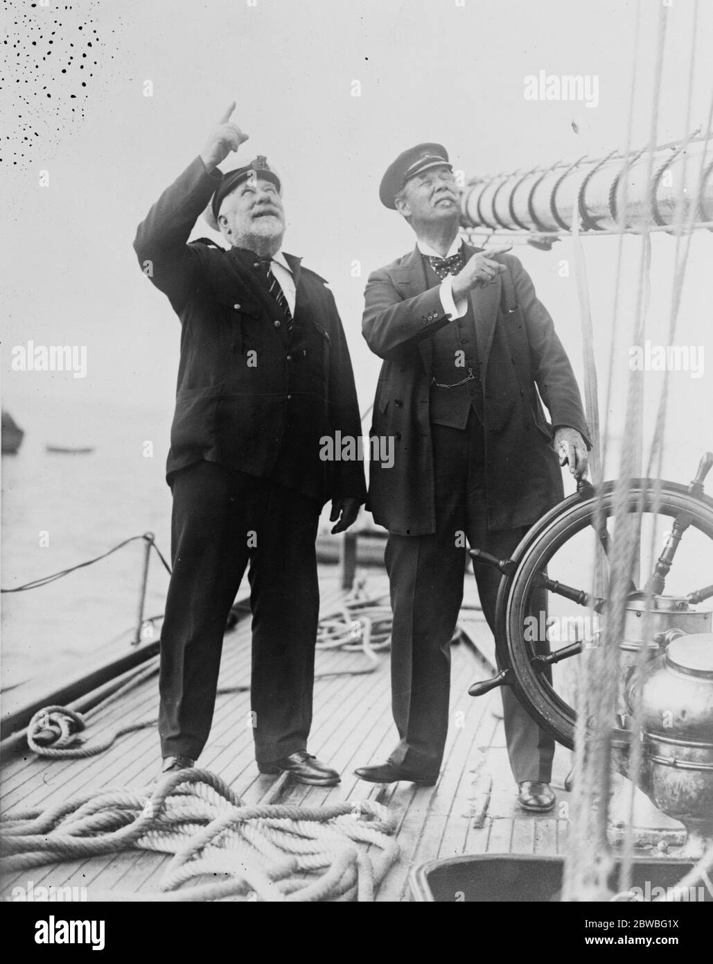 Sir Thomas Lipton on the  Shamrock  . Sir Thomas Lipton inspected his yacht  Shamrock  at City Island , New York , and announced that he would challenge again for America 's Cup in 1925 . Sir Thomas Lipton talking over the  Shamrock 's  possibilies with Capt W Manning . 30 August 1923 Stock Photo