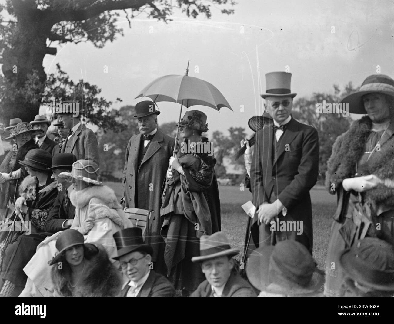 Polo at the Ranelagh Club , West London . Anglo - French Polo match for the Verdun Cup . Pictured are Earl and Countess Haig under the parasol . 17 June 1922 Stock Photo