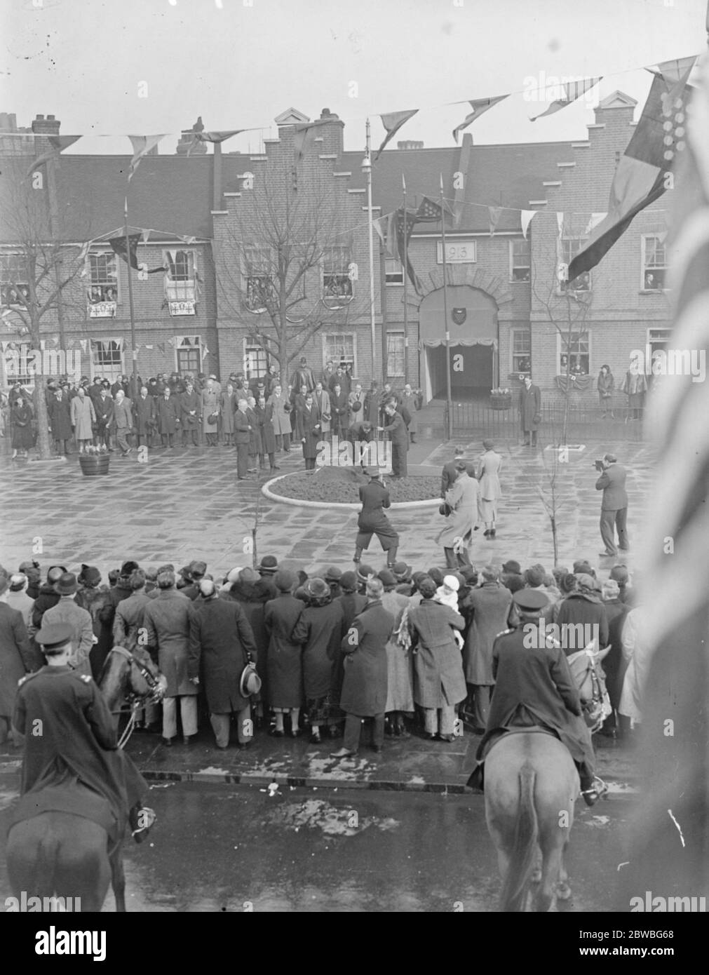 King George VI plants a tree in Denny Crescent during his tour of the Duchy of Cornwall . Stock Photo