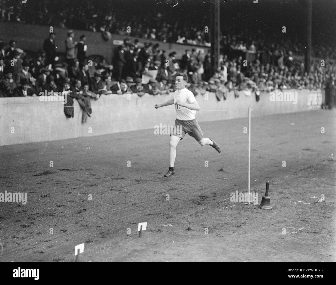 London Fire Brigade Athletics Meeting at Stamford T J W Wilcox wins the 440 flat race handicap  13 August 1921 Stock Photo