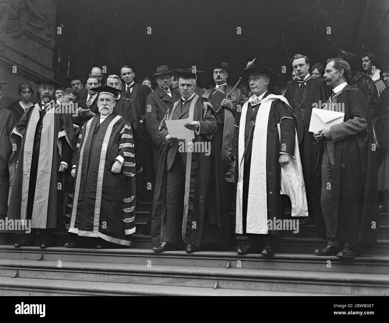 The declaration of the poll in cap and gown election , London University left to right Sir Sydney Russell Wells and Dr Walmsley , Chairman of Convocation ( Vice Chancellor ) 1923 Stock Photo