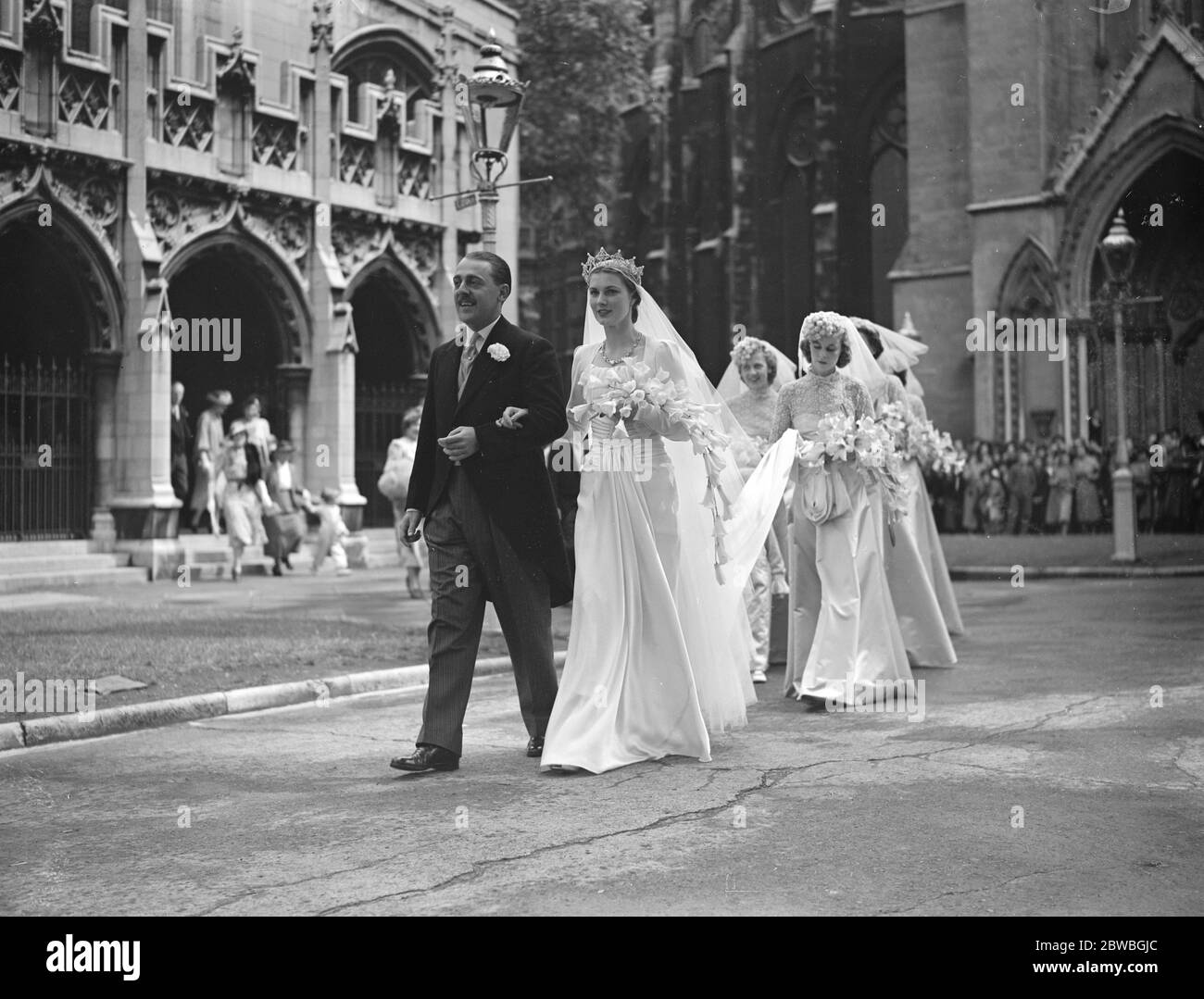 The wedding of Viscount Cowdray to the Earl of Bradford ' s daughter , Lady Anne Bridgeman , which took place today at St Margaret ' s Church , Westminster , London . Here the bride and groom leave the church with their bridesmaids . 19 July 1939 Stock Photo