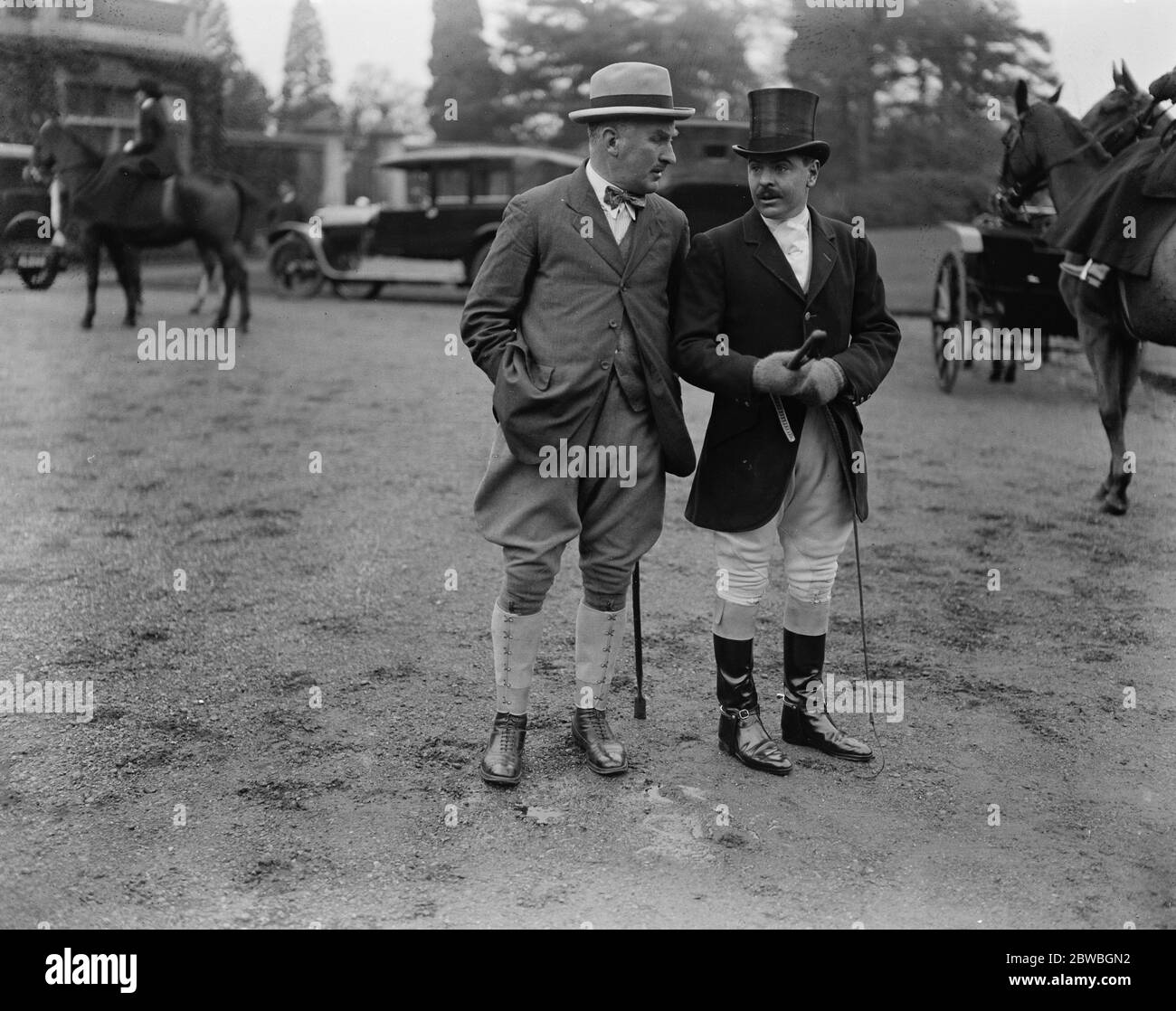 Meet of the Garth Hounds at Easthampstead Park , the Marquis of Downshire 's seat near Windsor . Lord Francie Hill , brother to the Marquis of Downshire , on right , chatting to a friend . 30 November 1921 Stock Photo
