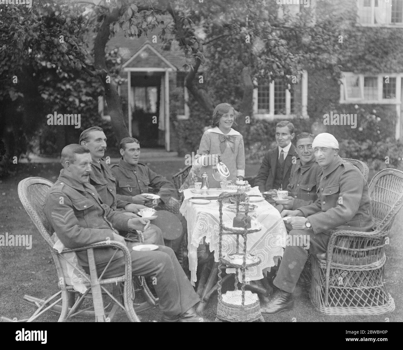 Miss Betty Hicks entertains wounded soldiers at her home in Merstham , Surrey Stock Photo