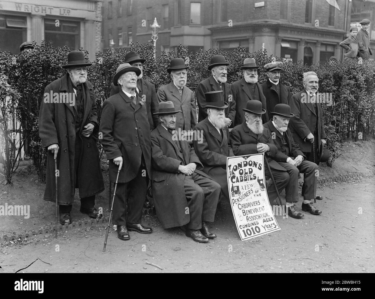 Twelve of the old boys who lorded it in the streets of London with hansom and growler in days gone by paraded outside the Cab Drivers ' benevolent association officers in Soho Square The Cabbies whose combined ages total 1010 years 15 June 1923 Stock Photo