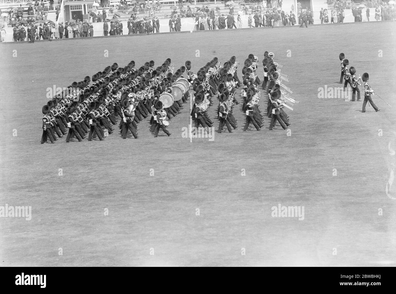 America Defeat England in the First International Polo at Hulingham sports club in Fulham in southwest London Massed Guards Band marching round the ground 18 June 1921 Stock Photo