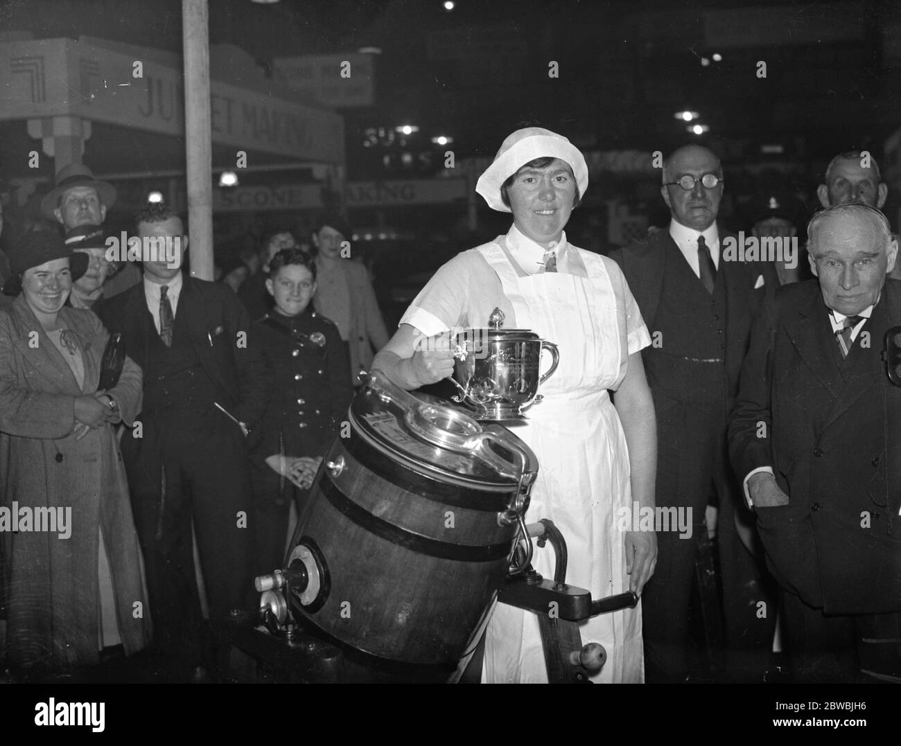 Miss GD Matthews , the new Champion Dairymaid at the Dairy Show , the Agricultural Hall , London . 25 October 1935 Stock Photo