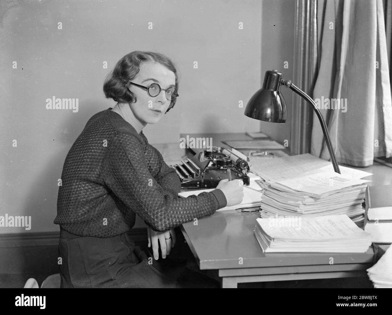 General election . Mrs Betty Fraser , Labour candidate for Streatham . She is here seen in her office , assisted by her husband , Mr R B Fraser , and canvassing . 9 October 1931 Stock Photo
