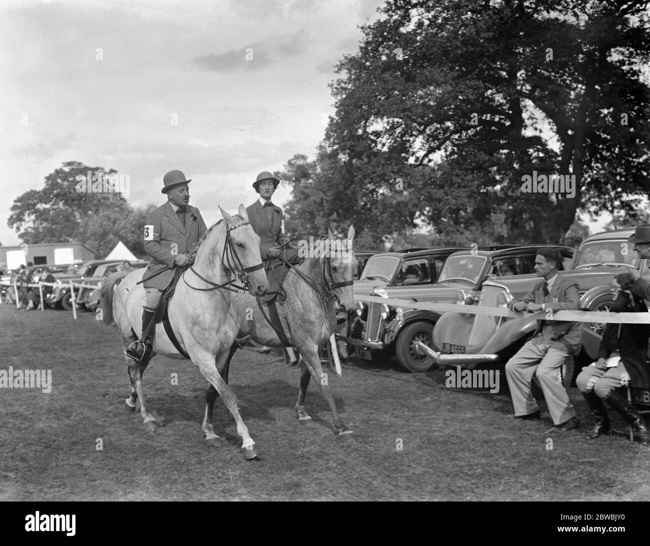 Braywood Horse Show . Major Faudel Phillips and Mrs R Gordon - Smith , winners in the Pair of Hacks class . 18 September 1937 Stock Photo