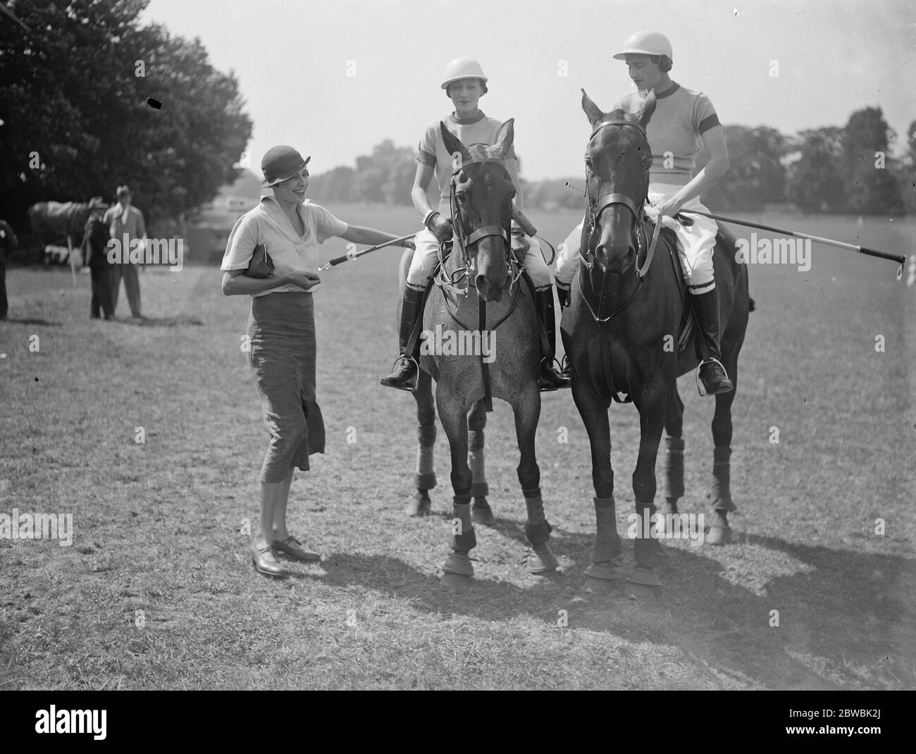 Ladies Polo at Ranelagh Mrs Leslie chatting to two of the ' Oddments ' team , Hon Mrs Greenall ( Centre ) and Mrs John Bott 6 July 1934 Stock Photo