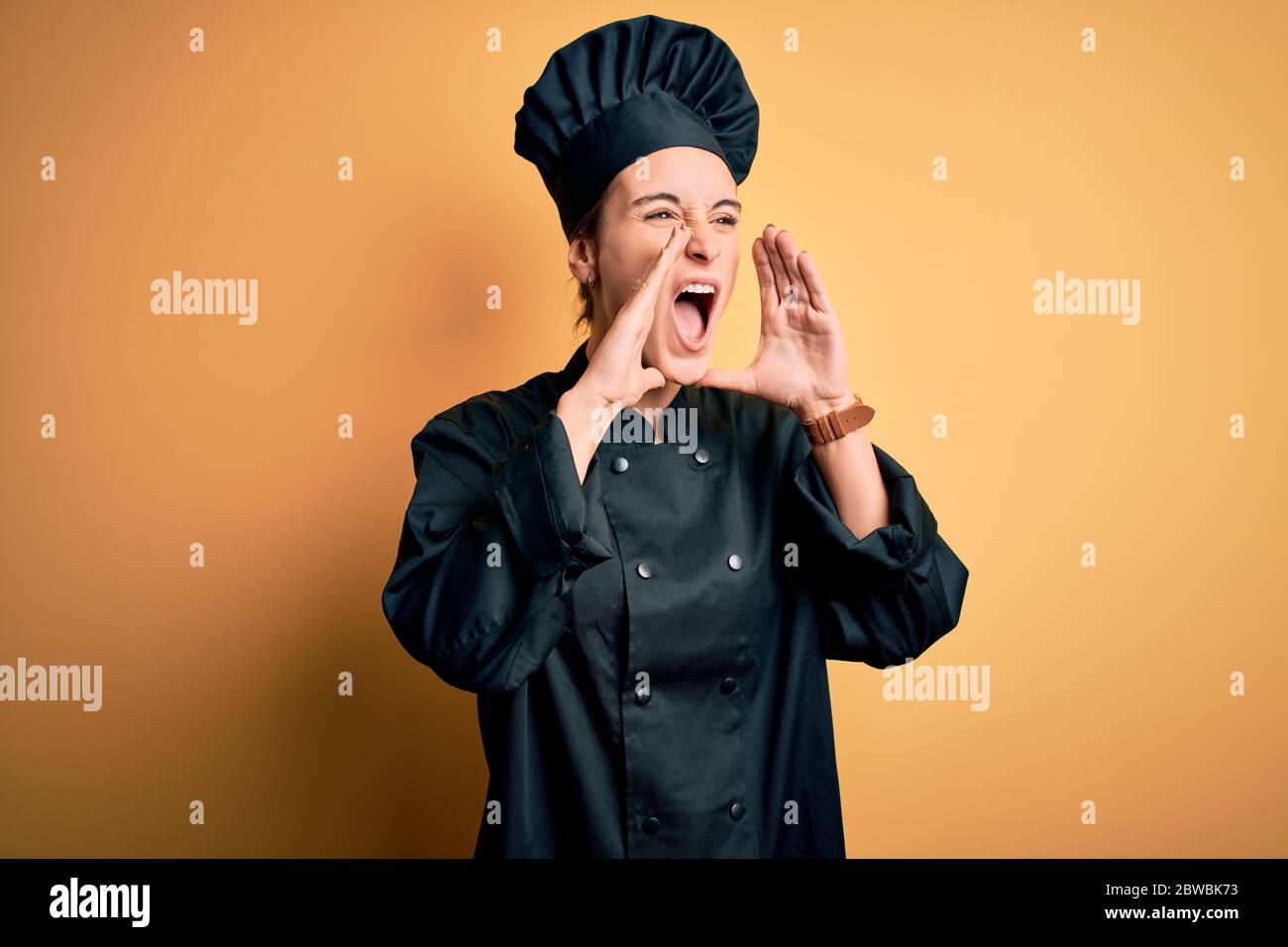 Shouting female cook uniform hi-res stock photography and images - Alamy