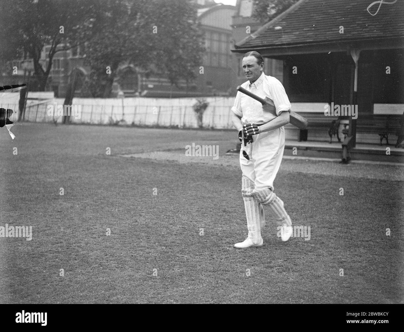 Peers and MP s at Cricket The House of Commons and the House of Lords opposed Westminster School on the ground of the latter . Lord Gainsford. Colonel Sir Matthew Wilson coming out to bat 15 June 1922 Stock Photo