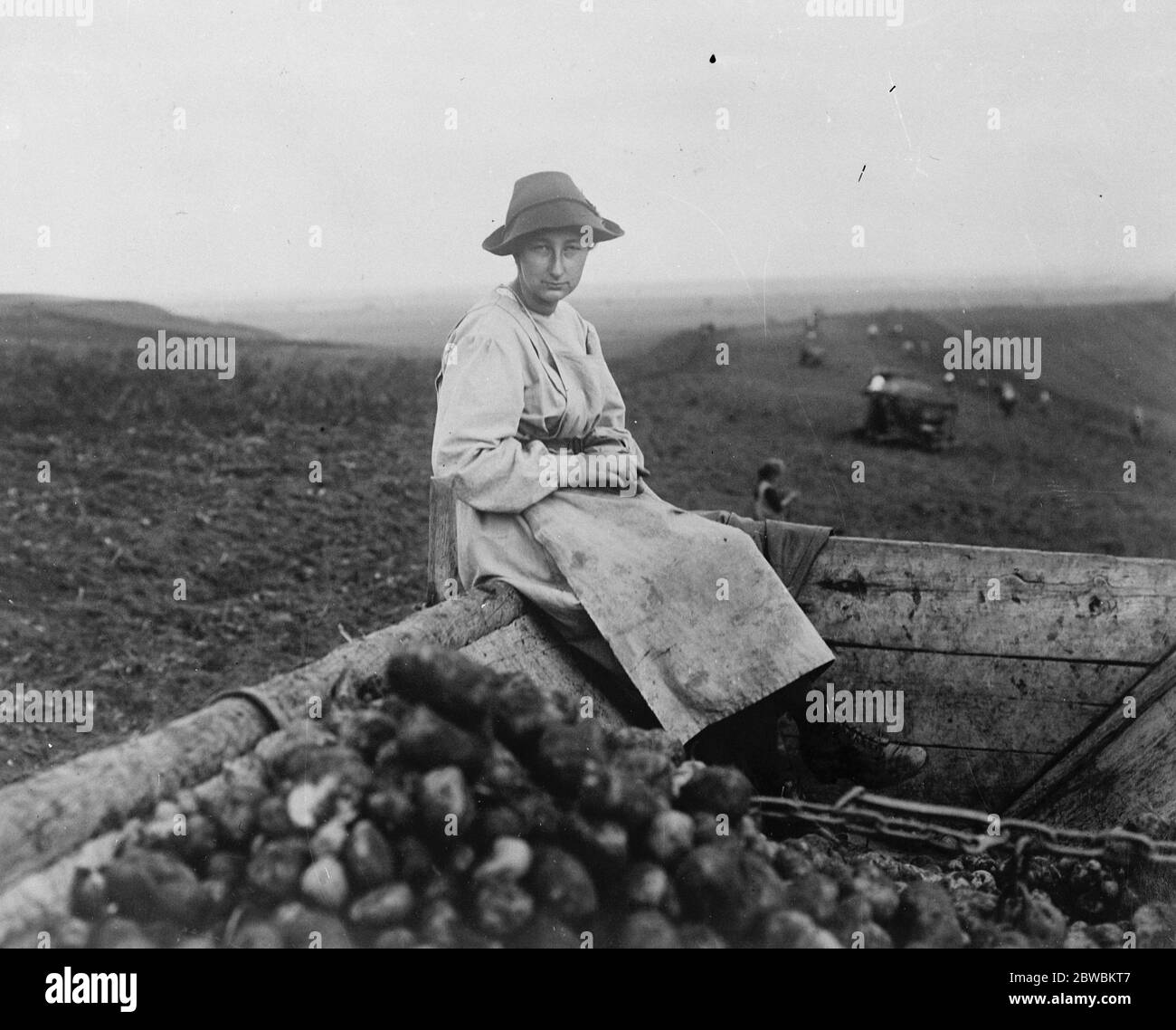 King 's sister works in potato fields . Princess Eudoxia of Bulgaria , photographed while enjoying an unconventional holiday on a farm some 50 miles from Sofia . 3 May 1924 Stock Photo