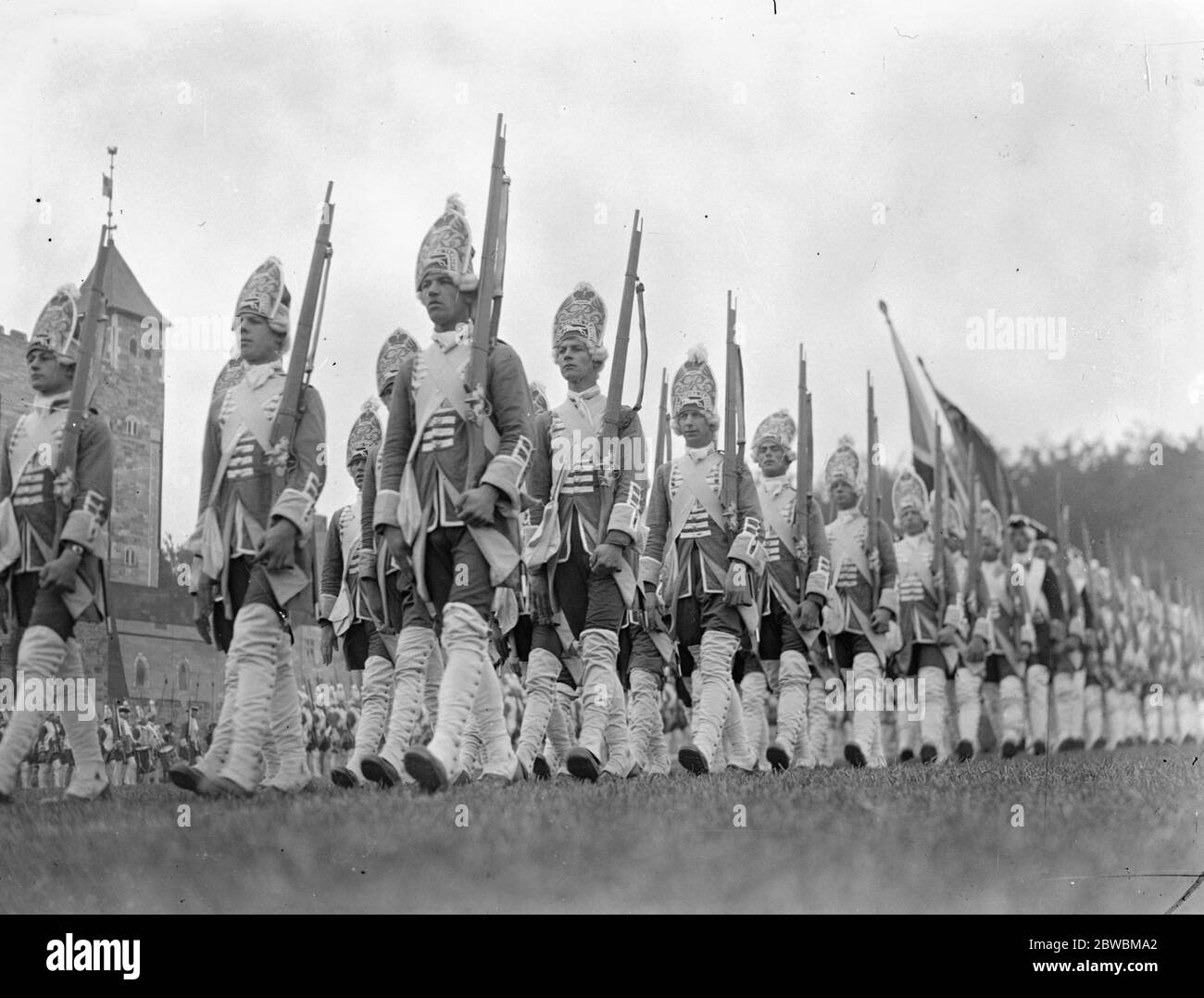 The sfull dress rehearsal in the Rushmoor arena , Aldershot , Hampshire , for the Aldershot Tattoo . Soldiers dressed in the uniforms of eighteenth century Foot Guards . 30 May 1935 Stock Photo