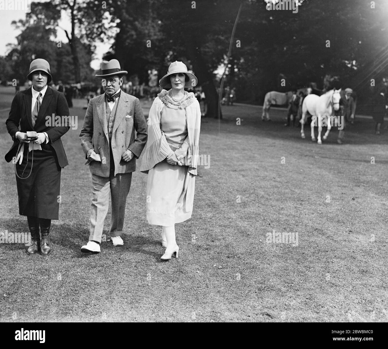 At the Ranelagh Club Pony show - the Honourable Mrs Freddie Cripps , Sir John and Lady Lavery . 10 June 1928 Stock Photo