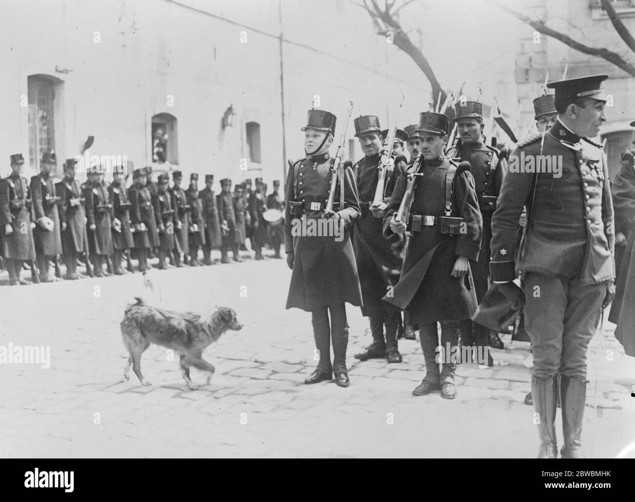 Spanish Crown Prince as Corporal The Prince of the Asturias , Heir ro the Spanish Throne , with a regimental mascot by his side Stock Photo