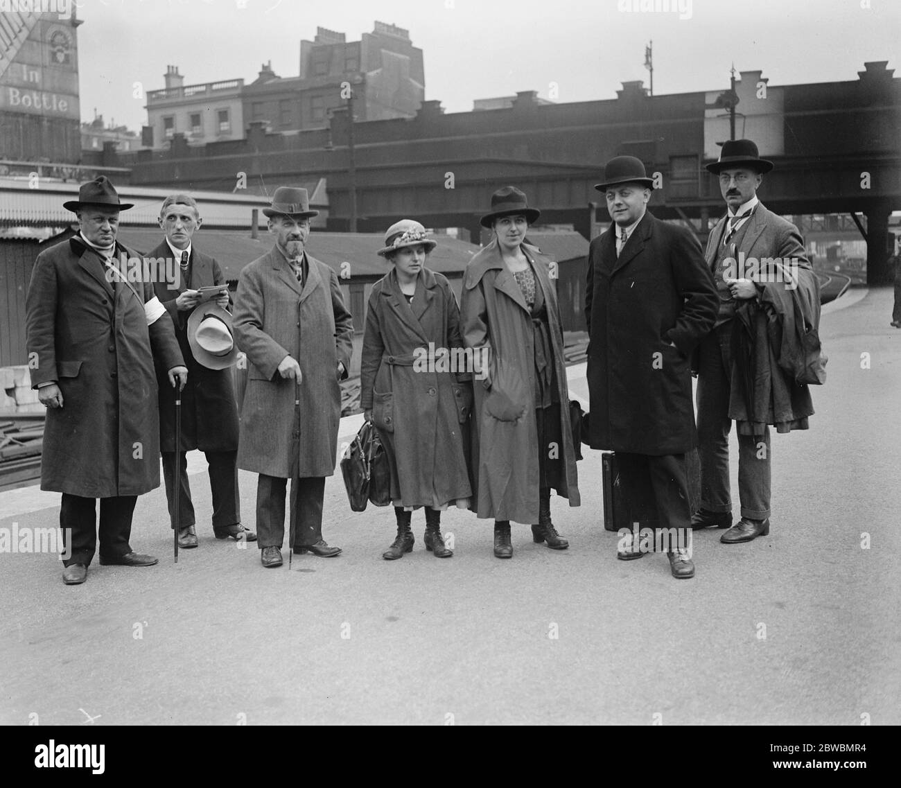 No more war  demonstrators . Delegates arrive for International Peace Congress . A party of Delegates arriving at Victoria to participate in the International Peace Congress and the No More War demonstrations which are to be held in 100 towns in Great Britain . On left is the Rt Rev Alexander Giesswein , DD , Chairman of the Hungarian Peace Society . 24 July 1922 Stock Photo