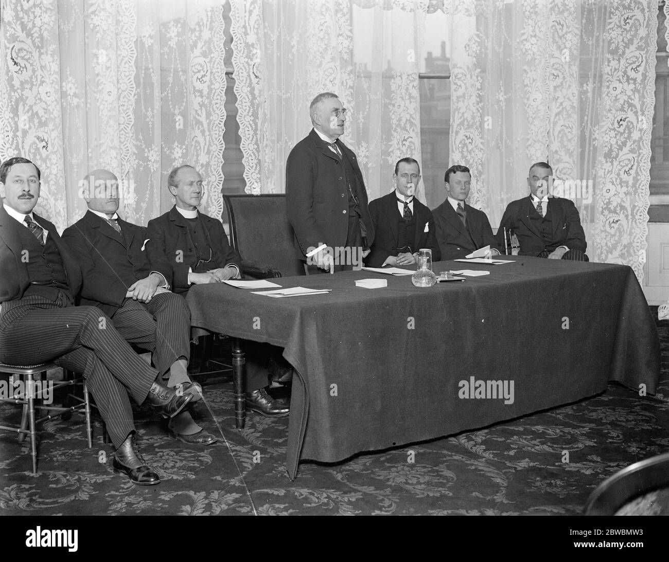 Constitutionalists Association holds its first meeting . An interesting gathering took place at the Langham Hotel , when the newly formed Constitutionalists Association held its first meeting . Capt A M Davis , Mr J Morewood Dowsett , Prebendary A W Gough , Admiral A H Smith Dorrien , Capt A E Illingworth , Mr Holford Dixon , Mr Leigh Pemberton . 5 March 1924 Stock Photo
