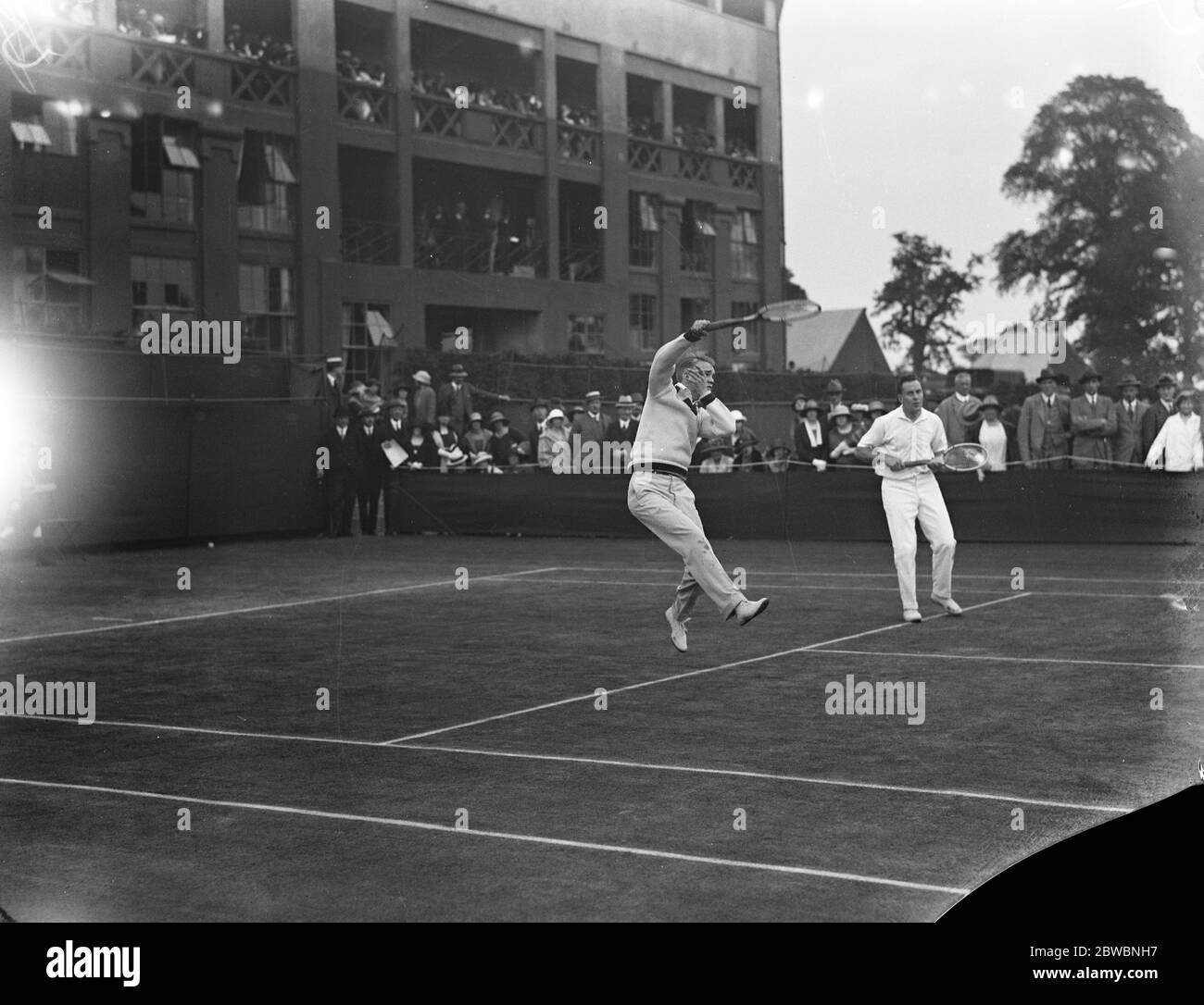 Lawn tennis championships at Wimbledon . Vincent Richards and F T Hunter in play against S M Haid and D R Rutham . 2 July 1923 Stock Photo