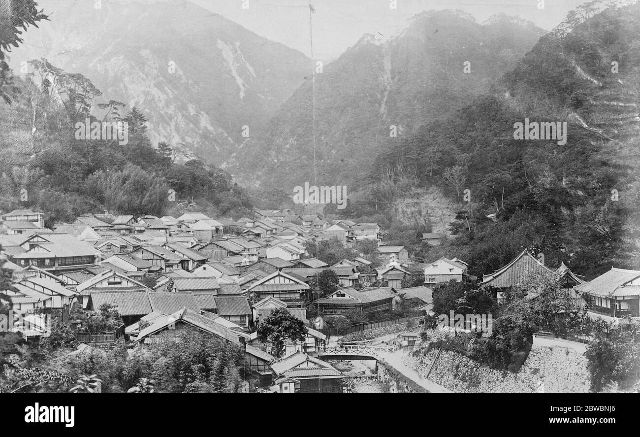 Scene of Japanese earthquake disaster . Arima village , the scene of the Japanese earthquake disaster . Hundreds of houses were wrecked and 18 persons killed .  11 December 1922 Stock Photo